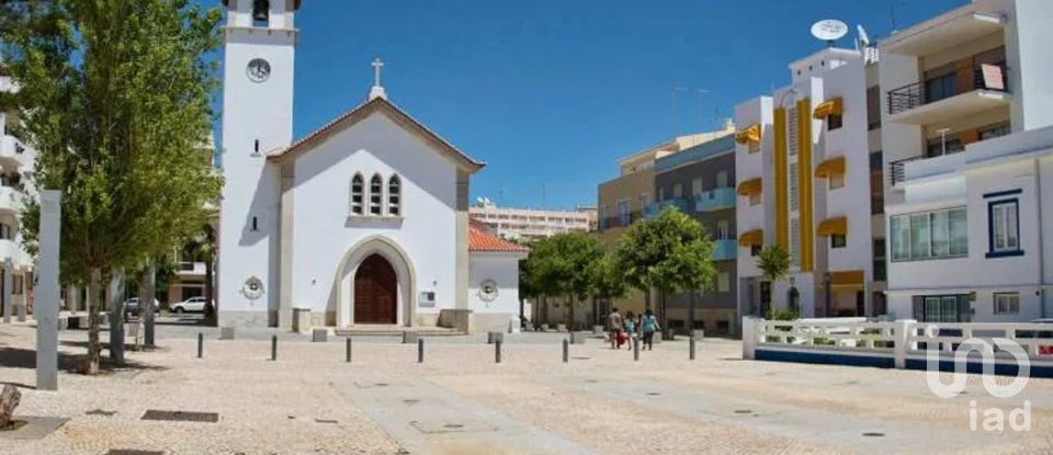 Terreno urbano em Alcantarilha e Pêra de 3 640 m²